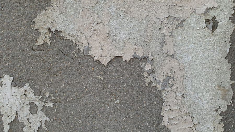 Vieux mur enduit dégradé